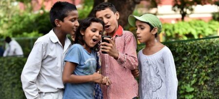 children using phone.1