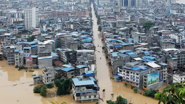 Heavy rains wreak havoc in China 15 dead and three